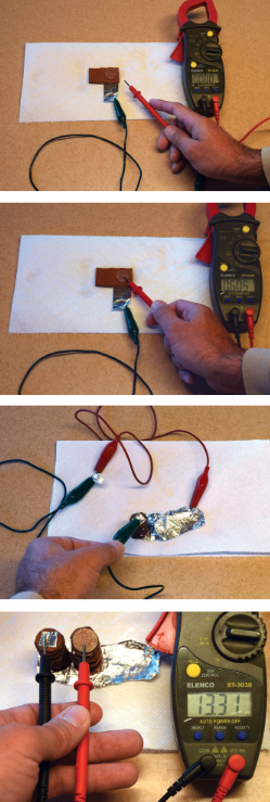 At left from top: A simple cell can be made with a piece of cardboard that has been soaked in a solution of salt and vinegar sandwiched between aluminum foil and a copper penny. An aluminum-copper cell will produce approximately 0.6 volts. Stacking several penny cells, as with batteries in a flashlight, will increase the voltage. A small stack of penny cells can produce enough voltage to light up a single LED. A stack of 24 of the little cells made a battery that produced 13.3 volts.
