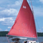 Her black hull and tanbark sail make Orca, John and Julie Mohr’s Bay Hen 21, instantly recognizable on Indiana’s Lake Monroe.