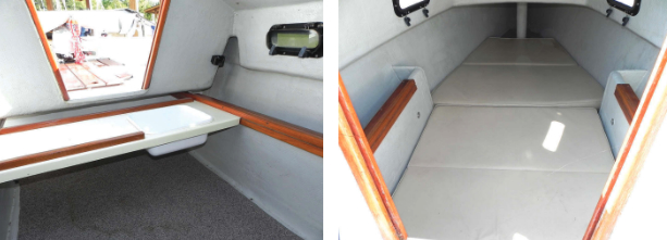 As interiors go, that in the Bay Hen 21 is spare, but the slide-out galley counter with a “sink,” at left, makes it more luxurious than the average tent. The bilgeboard trunks port and starboard define the main cabin, at right, and provide backrests for sitting athwartships.