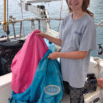 Image of putting a beanbag in a sailbag