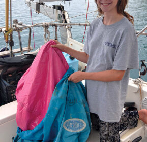 Image of putting a beanbag in a sailbag