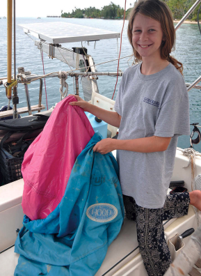 Image of putting a beanbag in a sailbag