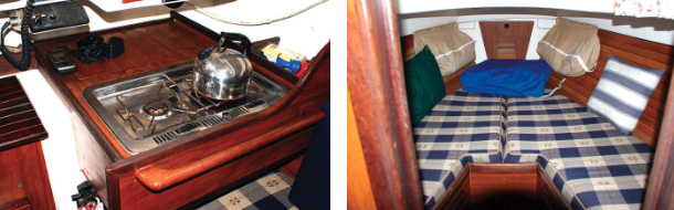 Divided by the companionway, the compact galley has an alcohol stovetop to port, at left, and a sink and icebox to starboard. The 6-foot by 6-foot V-berth, at right, is even more commodious with the filler cushion. Teak ceilings covering the hull sides look and feel shippy.