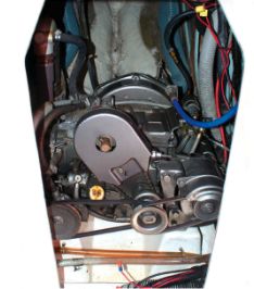 The single-cylinder Yanmar diesel is under and behind the companionway steps. It's a little loud, but it can be started with a hand crank in an emergency.