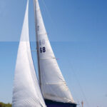 The Cape Dory 27 Scotch’s Too III, sailed by Phil Bills on the Ohio River, shows off the low sheerline and balanced overhangs, today considered “classic,” that are characteristic of the designs of Carl Alberg.