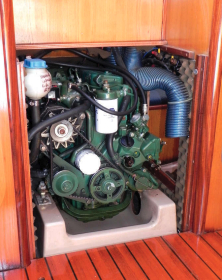 The engine is under the cockpit but access to it is good from the sides and when the companionway ladder is removed.
