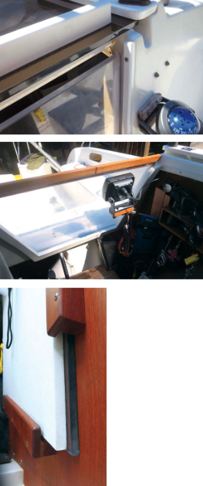 The piece of clear Plexiglas that Henk used for the hatchboard was short by two inches, at top, but that proved to be a good thing as the gap allows for ventilation but, most of the time, does not admit rain. For those occasions when the wind and rain are from aft, a teak strip closes the gap, above. After expanding the storage space a little, Henk is able to stow the Plexiglas board alongside the normal hatchboard, at left.