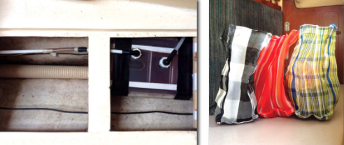 Icebox meltwater collects in a container in the bilge, far left. The drain hose and vent line are fitted on the top of the box, the pumpout line is connected to the bottom. The black tape keeps the lid firmly in place. Three plasticized or nylon bags, at left, don’t absorb water and keep smaller items organized so they don’t get lost in the icebox.