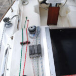 Joe sails singlehanded much of the time, and with his new mainsheet traveler control lines he can easily make adjustments to mainsail trim without leaving the wheel.