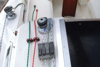Joe sails singlehanded much of the time, and with his new mainsheet traveler control lines he can easily make adjustments to mainsail trim without leaving the wheel.