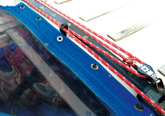 The bulls-eye obstructs the center twist-lock fastener on the front of the dodger but, to Joe, that’s a fair compromise.