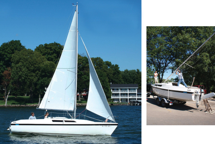 Allen and Ruth Penticoff sail Thebote, their MacGregor 26D, main picture, wherever they feel like trailering her. One big factor enabling them to do so is the relative ease with which they can raise the mast, above.