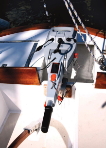 Modern technology has its place in the form of a silent-running Torqueedo electric outboard in a custom-built well, at left.