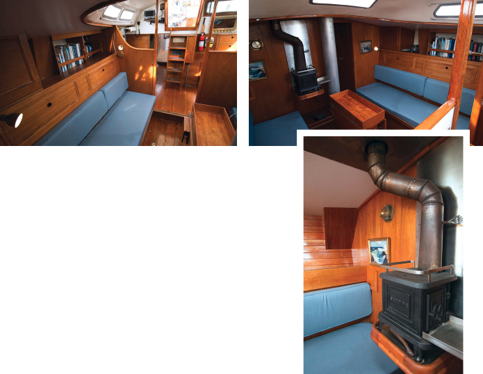 The conventional saloon offers solid handholds everywhere, at left. The low passageway to the aft cabin is just visible. Settees face a centerline table, upper right, and the wood-burning stove, lower right, takes the chill out of foggy mornings.