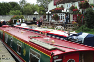 Canal-side pubs are an almost irresistible attraction for narrowboat, at top.