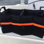 Collapsible and flexible, a car trunk organizer can turn hard-to-reach or awkwardly shaped spaces into orderly stowage for . . . most anything.