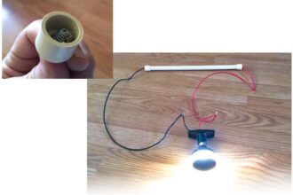 A cap at each end holds a spring taken from a wire nut of the type used in household wiring, at left. Tom now has portable power for testing 12-volt circuits.