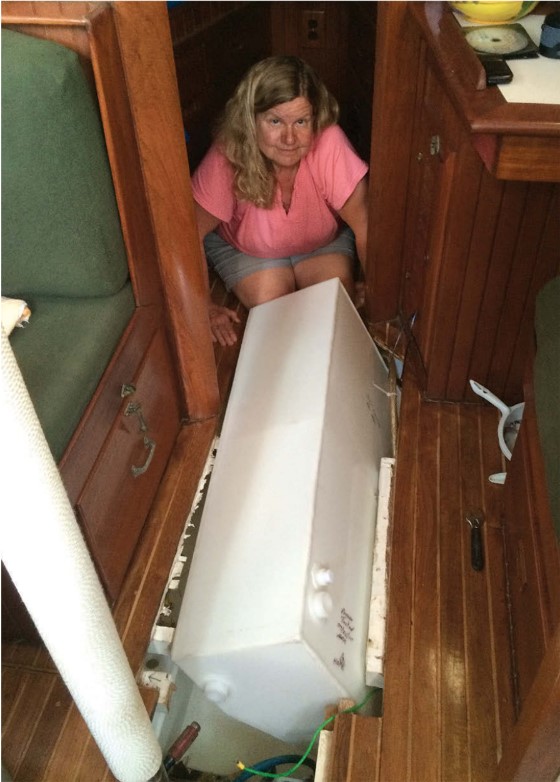 woman working tank into place