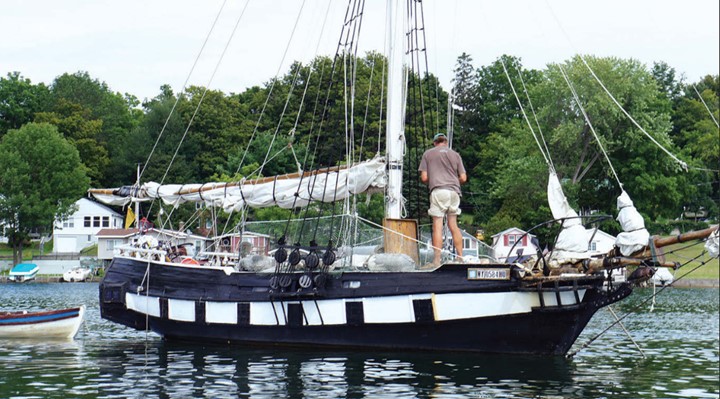 The Owl, a formerly junked Cal 25, has become a liveaboard home and “pirate ship” for her owner, John Lewis . . . and perhaps also a piece of folk art.