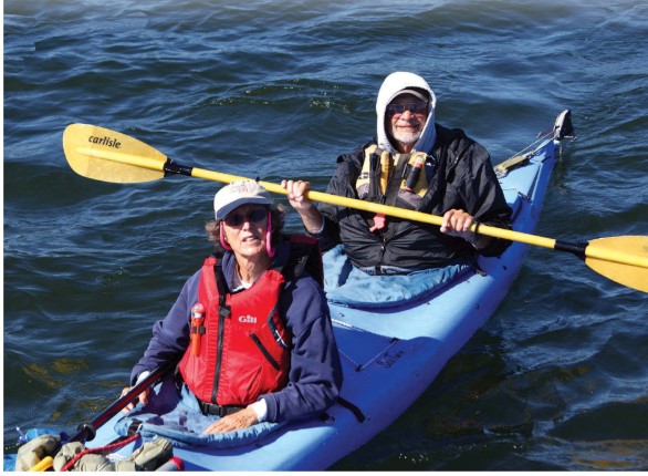 man and woman in kayak