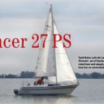 Todd Baker sails his Lancer 27 PS, California Dreamin’, out of Sandusky Bay, Ohio. With its raked bow and steeply sloped cabintop, the boat has an unmistakable appearance.