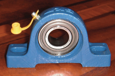 illow block bearings are used in countless industrial applications — anywhere a long drive shaft needs support. Housings are made in a variety of materials and designs. A split housing, for example, facilitates replacing the bearing. Connie and Dave used a bearing with a cast-iron one-piece housing.