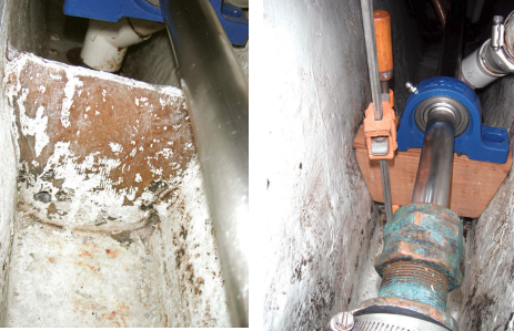 A small bulkhead in the bilge, far left, was in the right place for Dave to attach a wooden block to support the pillow block. He had just enough room to work in forward of the stuffing box, at left.