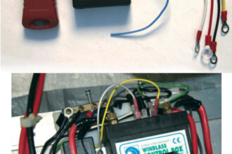 The remote control Darren ordered came as two components: the hand-held transmitter and a control box to mount beside the windlass controls, at top of page. Darren liked that this remote had a recessed on/off switch (red button) and an indicator light that shows it is on. The small control box for the remote fit neatly to the left of the larger windlass control box, at right. The yellow and white control wires that pair to the original green and white wires from the windlass control switch are easy to see.