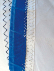 The stitching on a roller-furling headsail's sun cover is vulnerable to damage.
