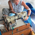 For inspecting and repairing sails, a clean, dry work area and a sewing machine (or a friend with one) make all the difference.