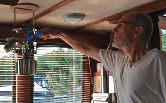 One of Dean’s morning rituals is removing the spiderwebs that festoon the boat inside and out, above. Dean pinched his Swiffer Duster from Charlotte, his wife. The design has since changed but he manages to force the new refills onto his old handle.