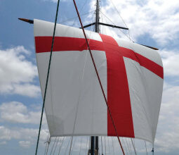 Sailing downwind driven by her square sail, Britannia rules the waves, at top.