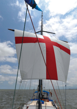Sailing downwind driven by her square sail, Britannia rules the waves, at top.