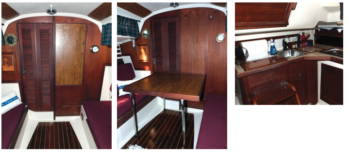 A louvered folding door leads to the head and forward cabin, far left. When lowered from the bulkhead and opened, the saloon table can seat four diners, at left. The compact galley wraps from the port side of the saloon to the companionway, above.