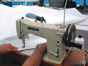 Sewing while simultaneously winding a bobbin saves time but requires two spools of thread.