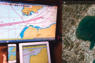 Menachem uses three navigation platforms on his boat, above. Google Earth images, like this one, of an anchorage near Agios Spiridon, Greece, are also helpful, at right.