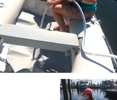 To fill up, at top, Janna connects the public water hose to the garden hose fitting on the dinghy bladder. When done, she secures the garden hose plug, above, so no water can spill on the ride back to the boat.