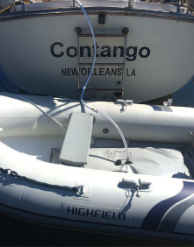 With the dinghy tied to the boat’s stern, a garden hose connects the bladder to the 12-volt pump (not pictured) that transfers the water into the ship’s water tanks.