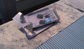 To make way for the new tank, Alan had to cut the top off the old one, cut out the baffles, and cold chisel away the remains of the welds.