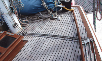 The hardest part of the mainsail furling installation was leading the outhaul and furling lines back to the cockpit. After many attempts at reducing friction and chafe, they ended up with an arrangement that was reliable and easy to use.