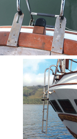 Wind Wanderer’s transom design, above, made climbing out of the dinghy a little tricky. Vic had custom brackets made to accommodate a folding boarding ladder.