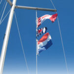 Flags flying from boat
