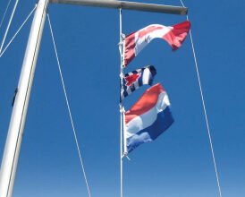 Flags flying from boat