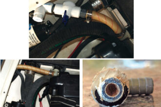 The ball valve and the tee are close to the holding tank, at top, where Clarence can reach them easily. The original plastic vent hose, which led from the holding tank, above left, behind the furniture to the through-hull fitting in the side of the hull below the rubrail, was so inaccessible Clarence reused it. He had little space to work in. One of the larger sanitation hoses conducts sewage to the tank from the toilet, the other is the pumpout discharge line. The through-hull vent fitting, above right, was completely blocked.