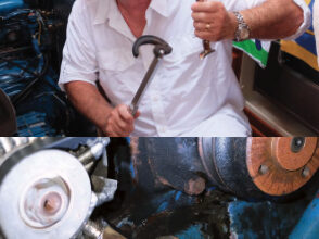Two simple tools, a basin wrench and a belt-tensioning jack, top left, are Jim’s “friends in low places” that enable him to deal with two maintenance demons that lurk in impossible places under and behind his V-drive-equipped engine. Armed with these tools, top right, he has a fair chance when reaching under the engine block to adjust the stuffing box or when setting the accessory-belt tension. The belt-tensioning jack holds the present setting while Jim makes the adjustment, above. In addition, it provides a valuable extra hand where there is no room for a human one.