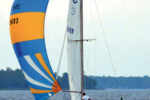Underdog races frequently on Michigan’s Bay of Green Bay, at top. Here, she’s flying a spinnaker that dates to her days as Vagus.