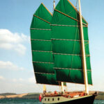 Annie Hill and Trevor Robertson sail Badger off Falmouth, England, at the beginning of a cruise that lasted many years and covered many miles and instilled in Annie the love for the junk rig that she harbors to this day.