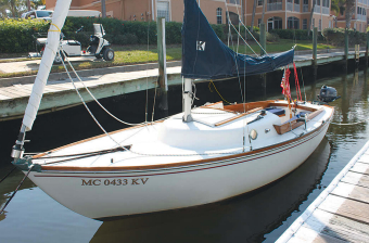 The circular port in the small, delicately proportioned cabin trunk is characteristic of the Typhoon Weekender.