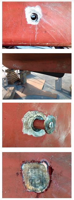The recess in the keel is for the fender washer that locks in the pin, at top. The board is painted and in place, above. After inserting the pin, below, John glassed over the washers and sidewalk bolts, at bottom.