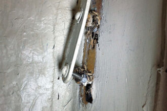 The offending chainplate (inside a locker) was not going to hang on much longer, upper left, and a repair was urgently needed.